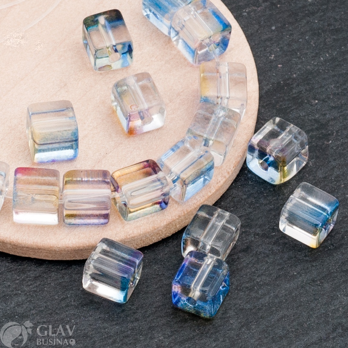 Прозрачные стеклянные окрашенные бусины-кубики, р-р 6х6х7мм, отв.1,4мм, цвет стальной синий.