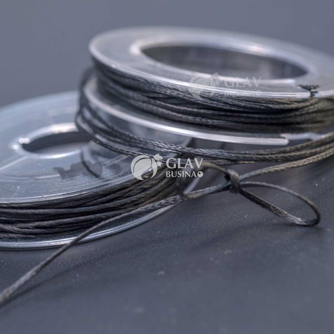 Черный вощеный шнур на катушке, плоский, крученый, полиэстровый, диам. 0.7мм, длина 10 м.