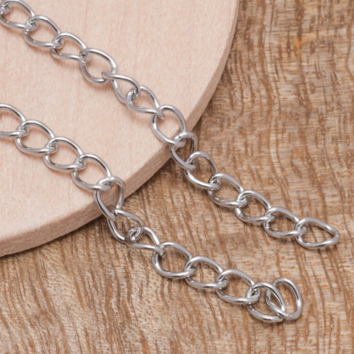 ОПТ (10 шт) Цепочка удлинительная из хирургической стали, паяная, с концевиком. Общая длина 5.5см, р-р звена 4х3х0.6мм, р-р концевика 8х0.8мм.