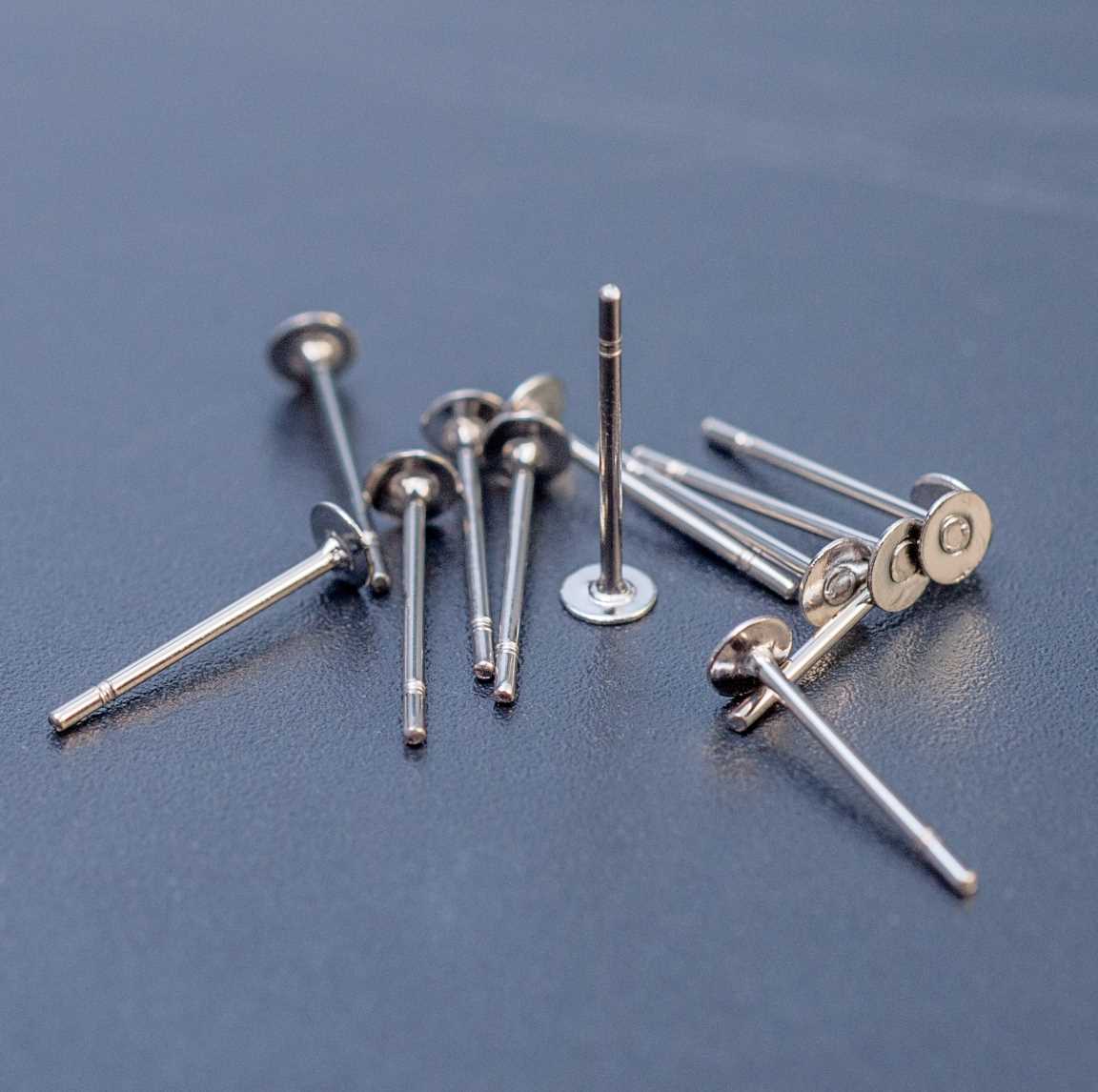 Пуссеты из хирургической стали с плоской площадкой 3мм и закругленным гвоздиком 12х0.7мм.