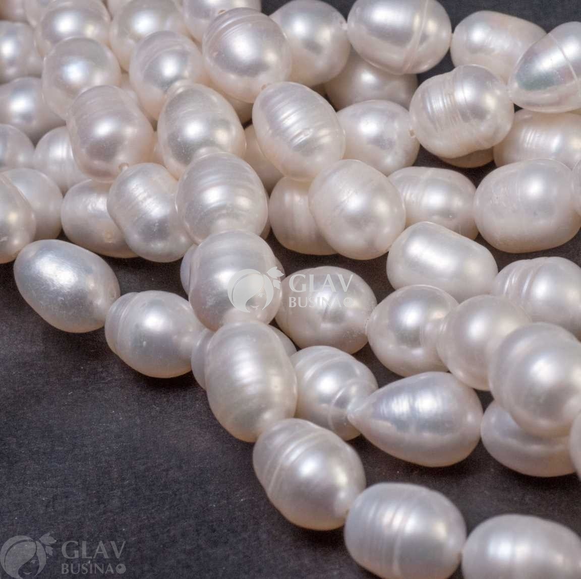 ОПТ (10 бусин) Жемчуг пресноводный, натуральный, рис с редкими бороздками, р-р 7х8-9мм, отв. 0.8мм, белый.