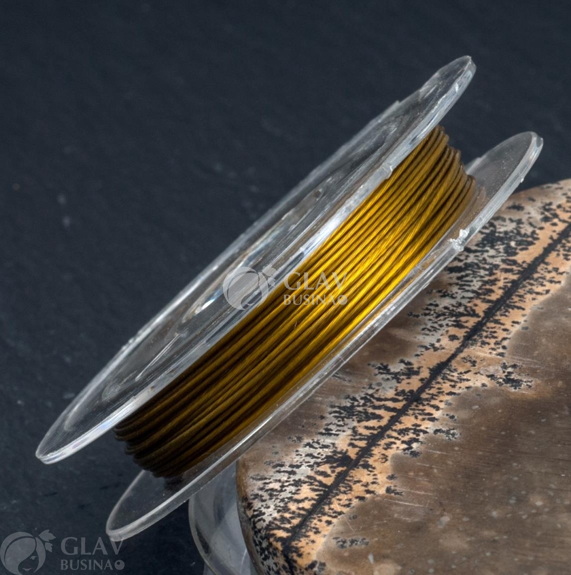 ОПТ (50 катушек) Ювелирный тросик на маленькой катушке, диам. 0.45мм, длина ок. 10м , цвет золотой.
