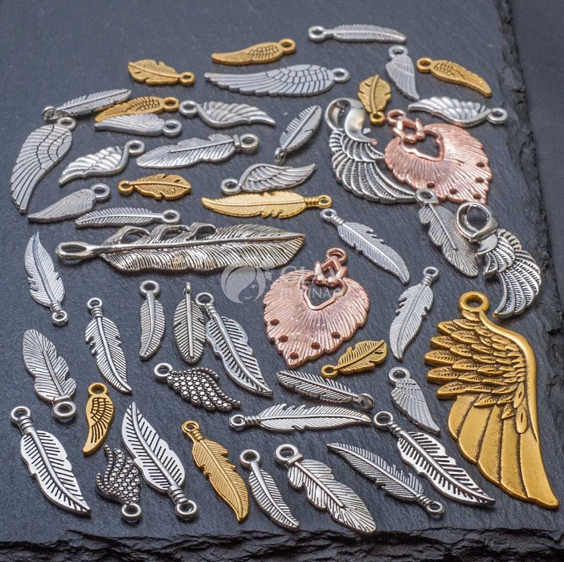 Микс 40 подвесок в тематике перья и крылья. Бижутерный сплав.