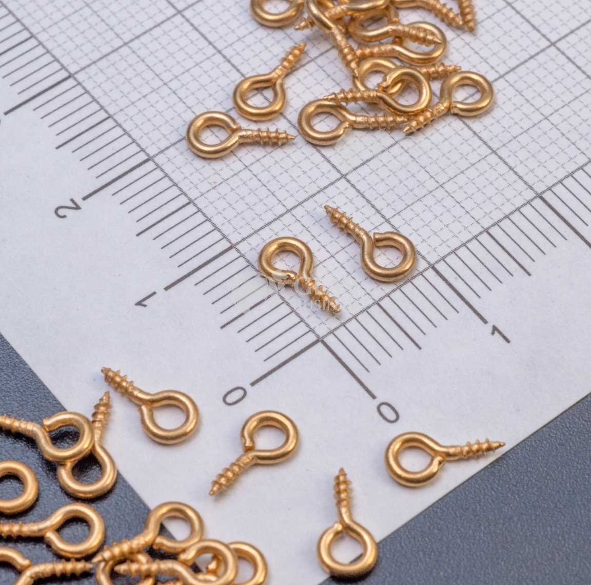 Бейлы винтовые из хирургической стали, цвет покрытия золото, длина 8 мм, толщина 1 мм, отв-е 2 мм.