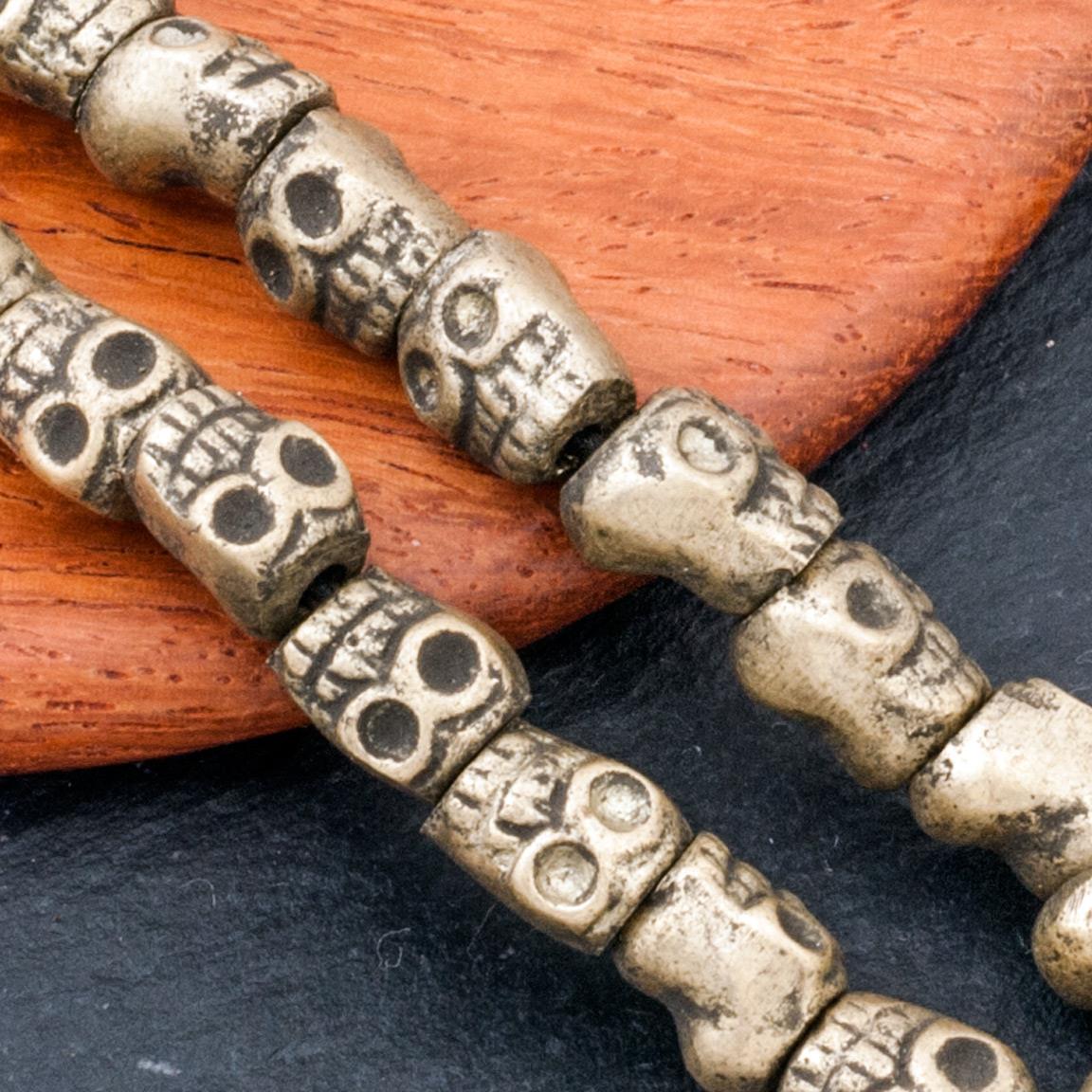 Бронзовые бусины-черепа, р-р 7х5-6,5мм, отв. 1,5мм.