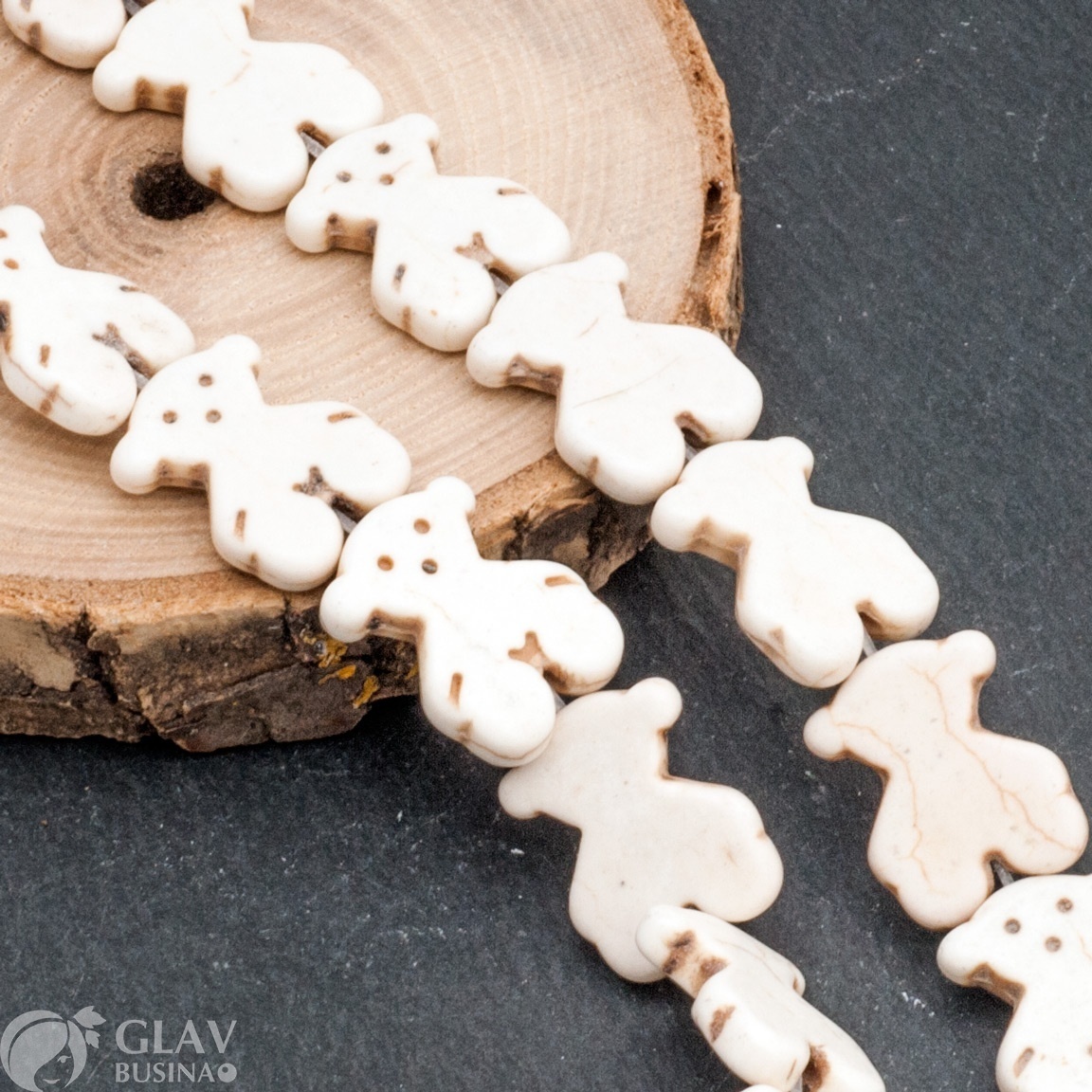 ОПТ (50 бусин) Бусины-мишки, прессованный говлит цвета слоновой кости, р-р 15х20мм, толщина 4мм, отв-е 1.5мм.