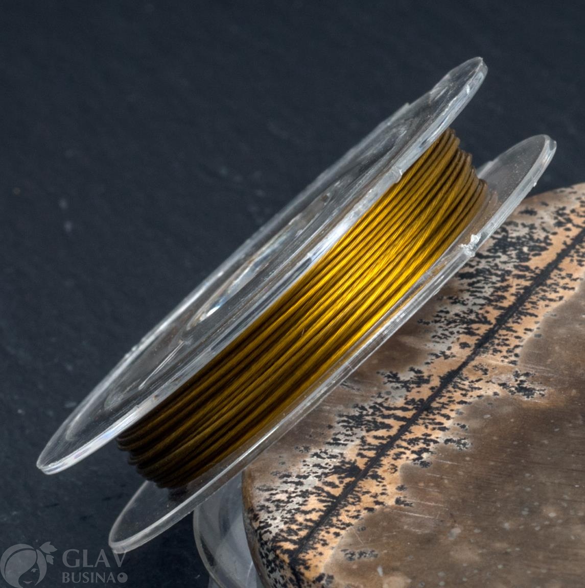 ОПТ (10 катушек) Ювелирный тросик на маленькой катушке, диам. 0.45мм, длина ок. 10м , цвет золотой.