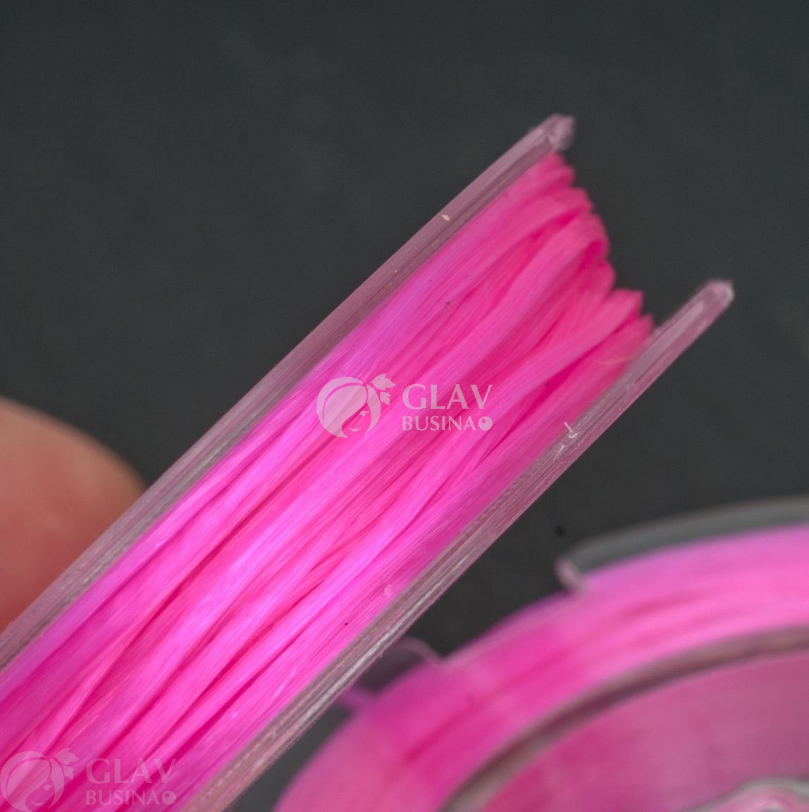 ОПТ (10 кат.) Браслетная резинка (спандекс) на катушке, диам 0,45мм, длина ок. 9м, цвет ярко-розовый.