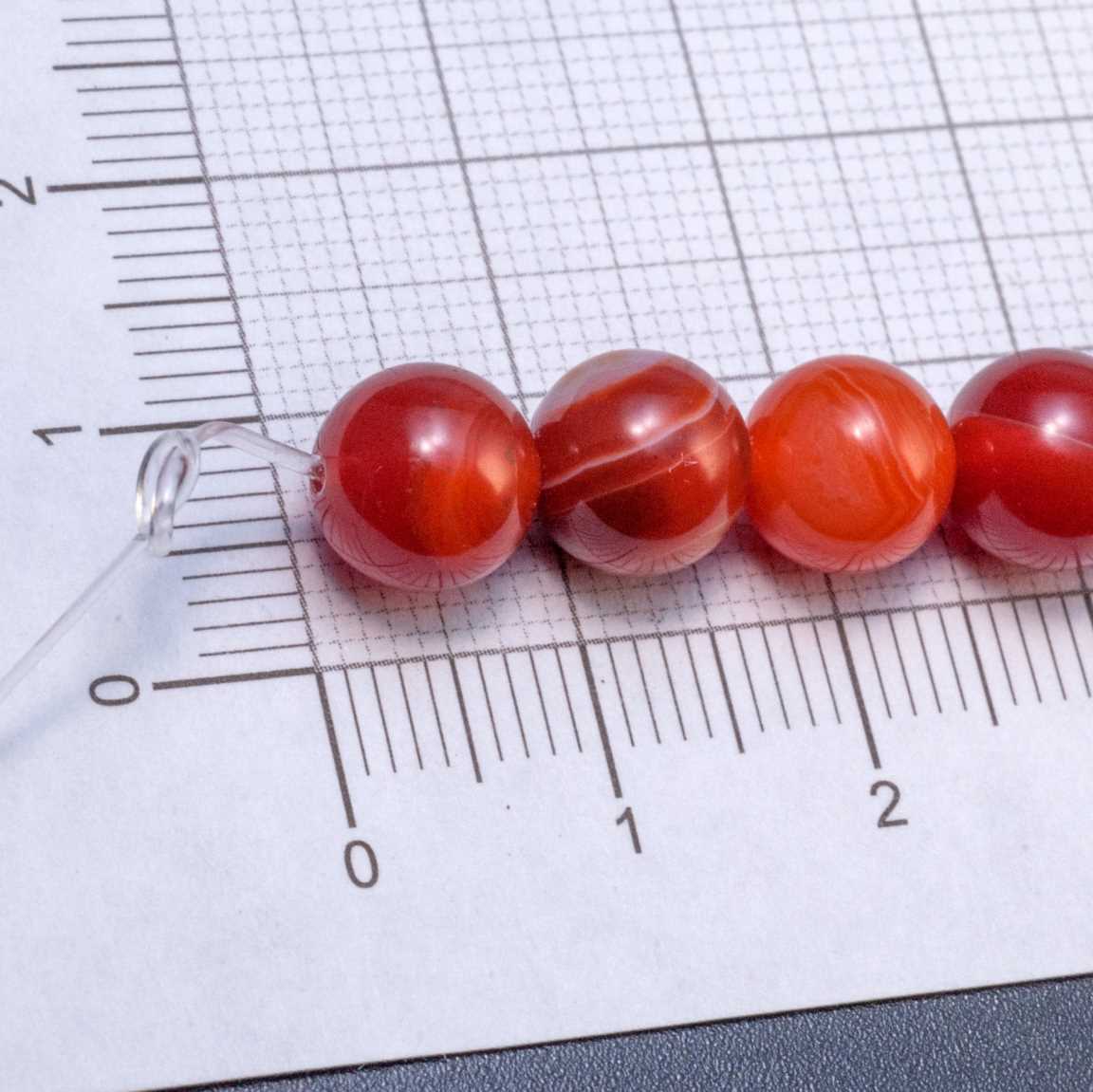 Нитка гладких полупрозрачных кракелированных бусин агата, шар, 8мм, отв 1,6м, цвет тонирования тигровая орхидея (красно-коричневый), в нитке 23 бусины / 18см.