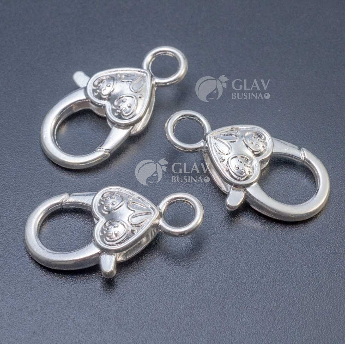 Замок-карабин из бижутерного сплава и виде сердечка, цвет серебро, р-р 27х14х6мм, отв-е 4 мм.