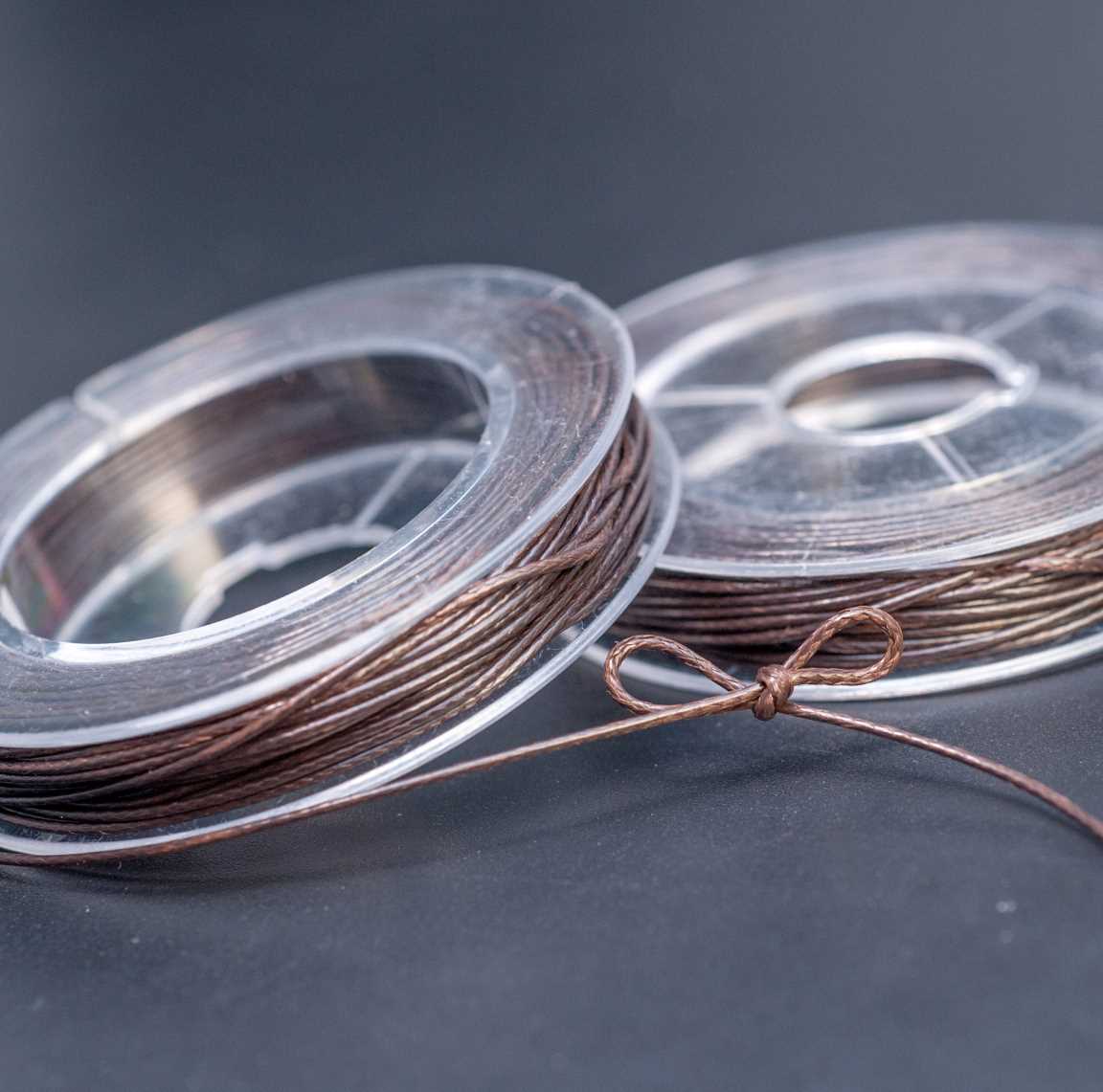 Темно-коричневый полиэстровый вощёный шнур Корея на катушке, круглый, змениная кожа, диам. 0.5мм, длина 10 м.