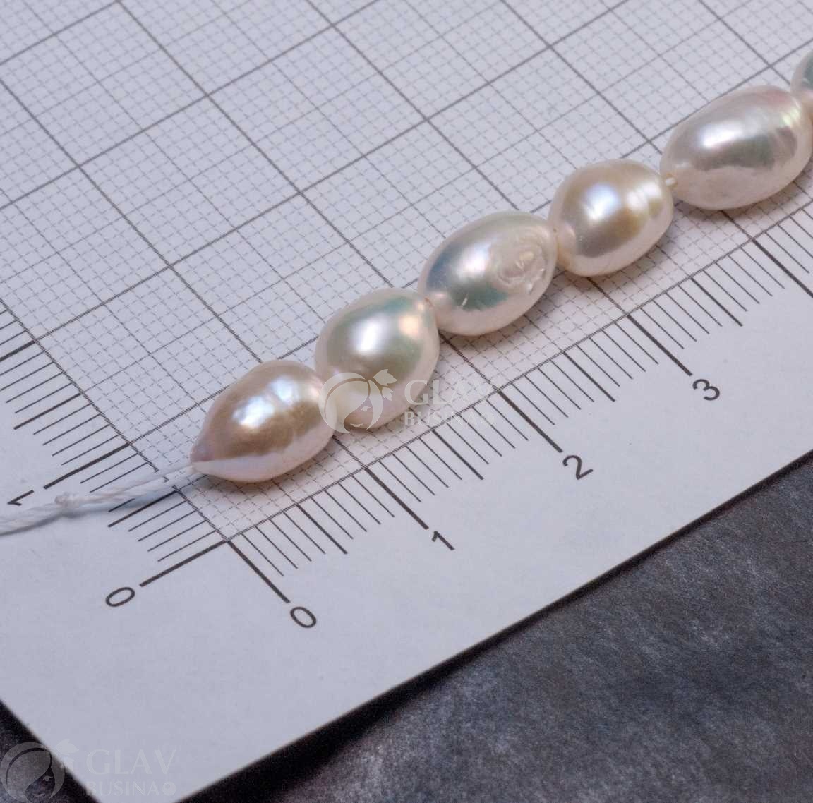 ОПТ (10 бусин) Жемчуг барочный пресноводный, натуральный, округлый не ровный, р-р 6-7х8-11мм, отв. 0.8мм, белый.