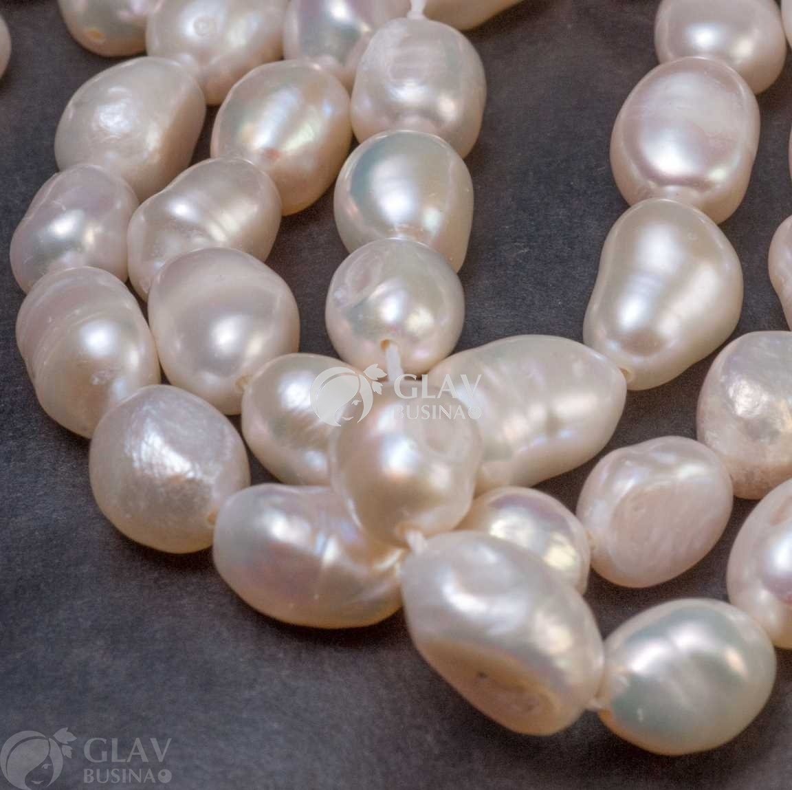 ОПТ (10 бусин) Жемчуг барочный пресноводный, натуральный, округлый не ровный, р-р 6-7х8-11мм, отв. 0.8мм, белый.