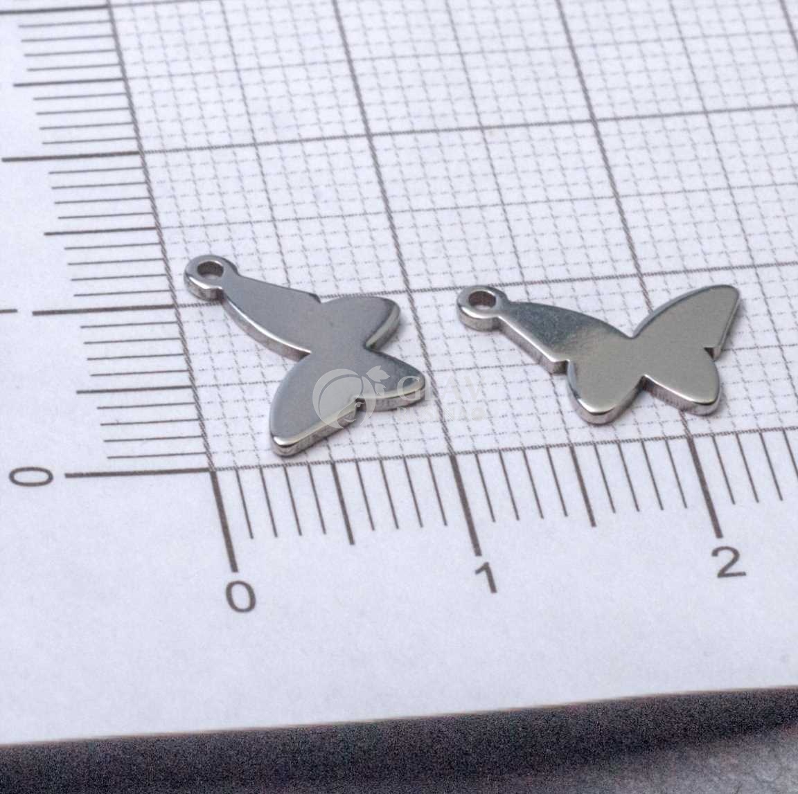 Бабочка, стальная подвеска, р-р 12х8х0.8 мм, отв-е 1 мм.