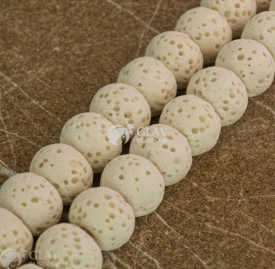 ОПТ (20 бусин) Бусины-рондели из натуральной лавы белые, тонированные, р-р 8х6мм, отв-е 1мм.