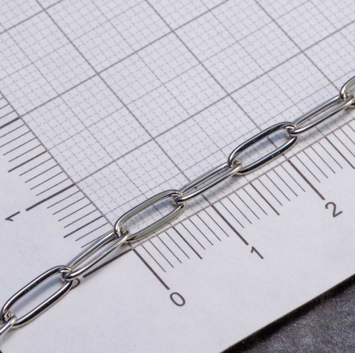Цепочка 9х3.5х0.4мм, якорная тонкая, звенья запаяны, нерж. сталь, цвет стальной, катушка 5 м.