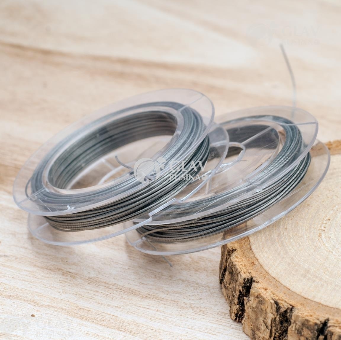 ОПТ (50 катушек) Ювелирный тросик на катушке, диам. 0.45мм, длина ок. 9м, цвет стальной.