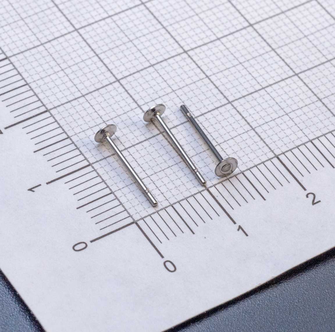 Пуссеты из хирургической стали с плоской площадкой 3мм и закругленным гвоздиком 12х0.7мм.