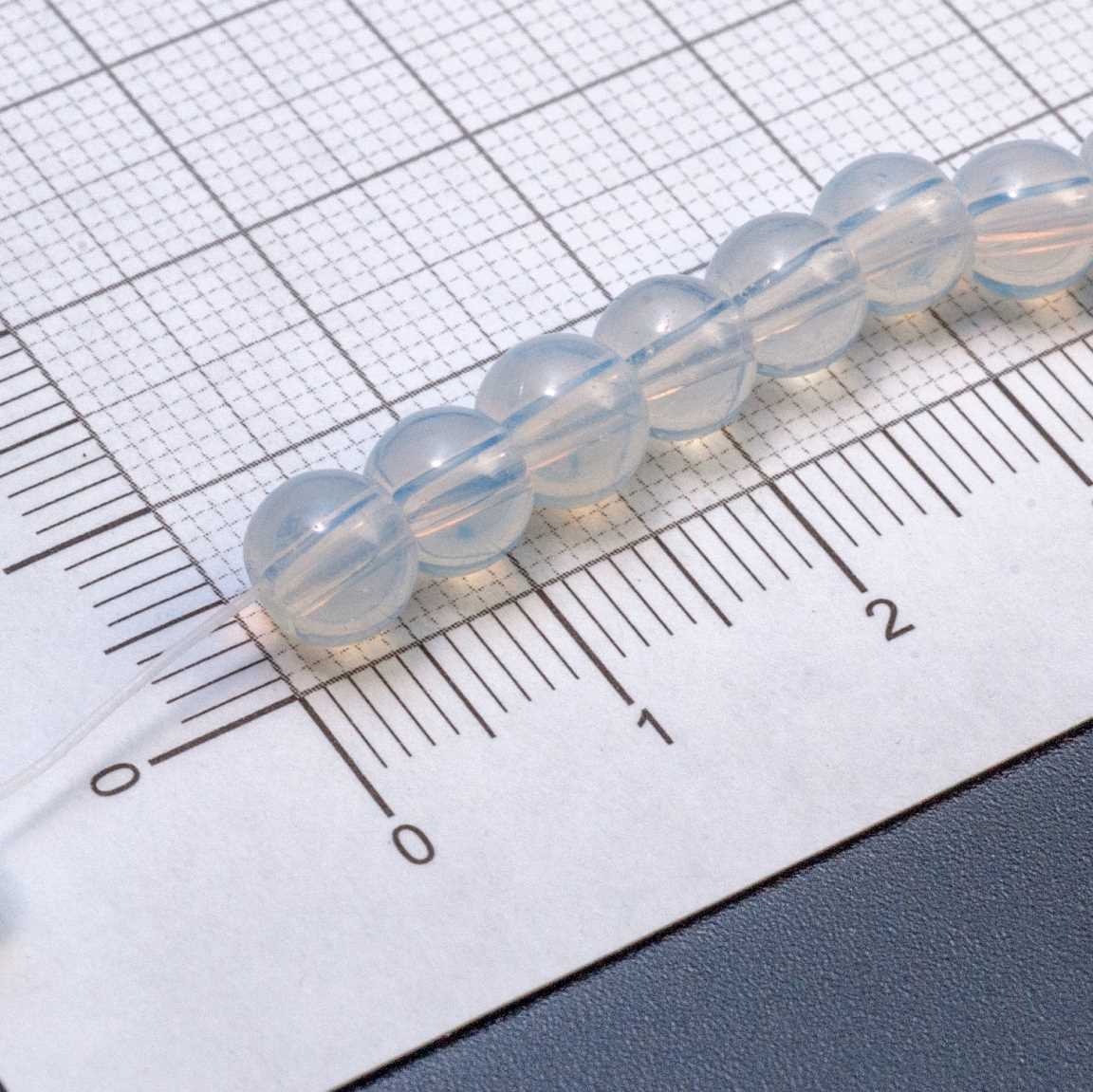 Бусины-шарики диам. 6 мм из прозрачного стекла, цвет молочно-белый, отв-е 1мм.