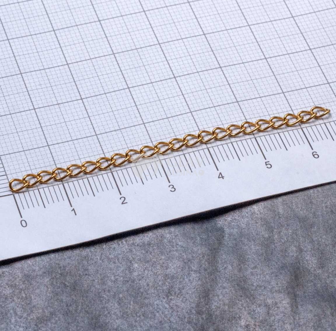 Стальная цепочка удлинительная твист, паяная,гальванизация золотом, длина 7см, р-р звена 4х3х0.6мм.